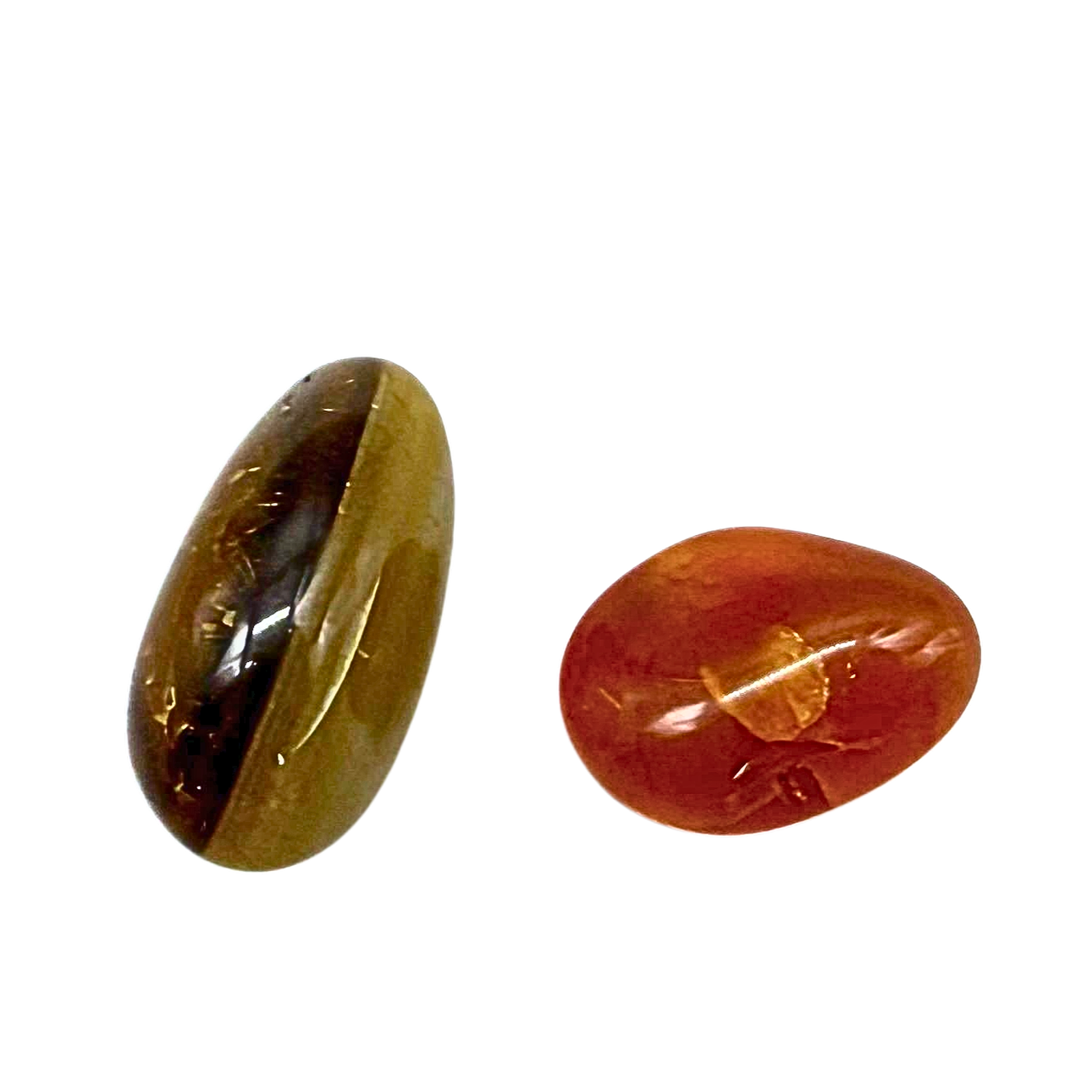 SET OF TWO DIFFERENT, FINELY POLISHED AGATES.