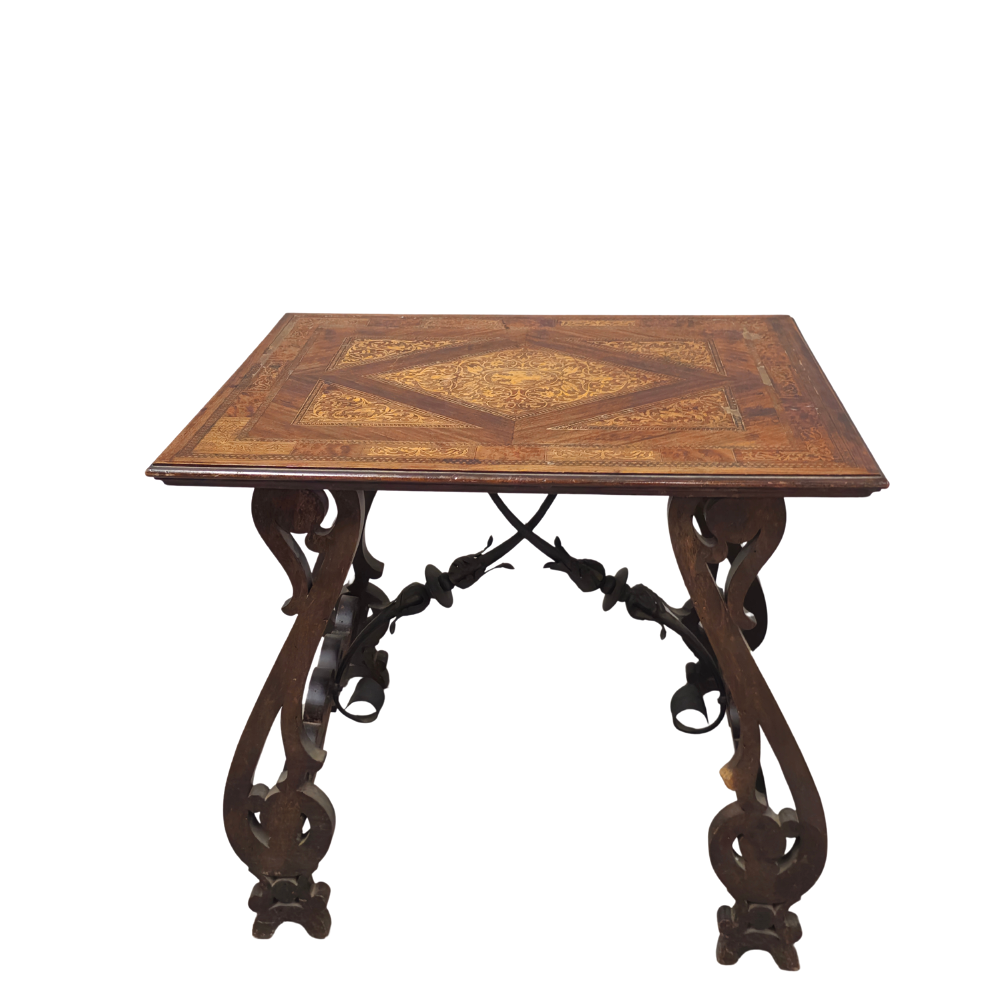 Marquetry table with wrought iron lyre legs.
