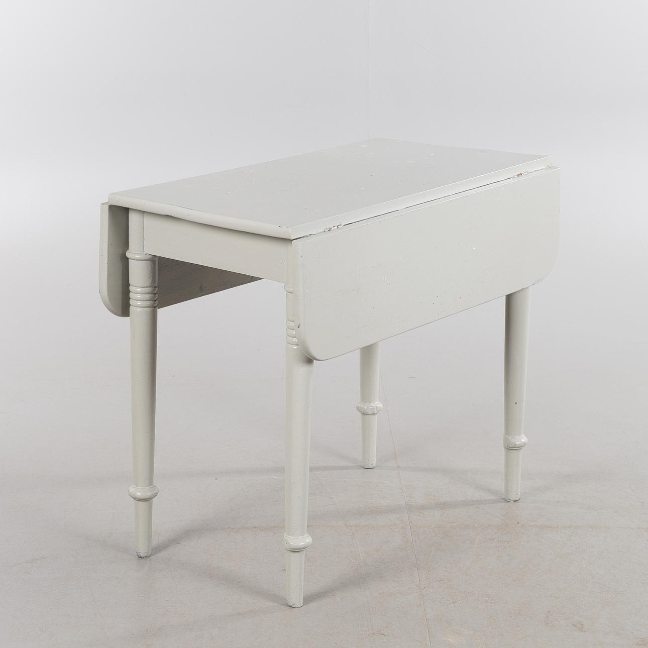 DROP-LEAF TABLE, grey-painted wood, circa 1900.