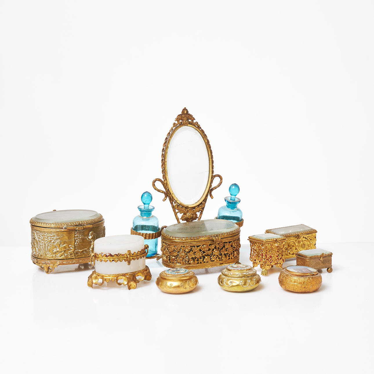 BOXES and BOTTLE STANDS. 9 pcs, brass.