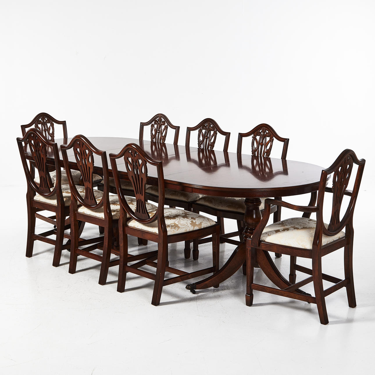 DINING GROUP, with 8 chairs, English style, 2015, solid mahogany, table with 2 extension leaves.