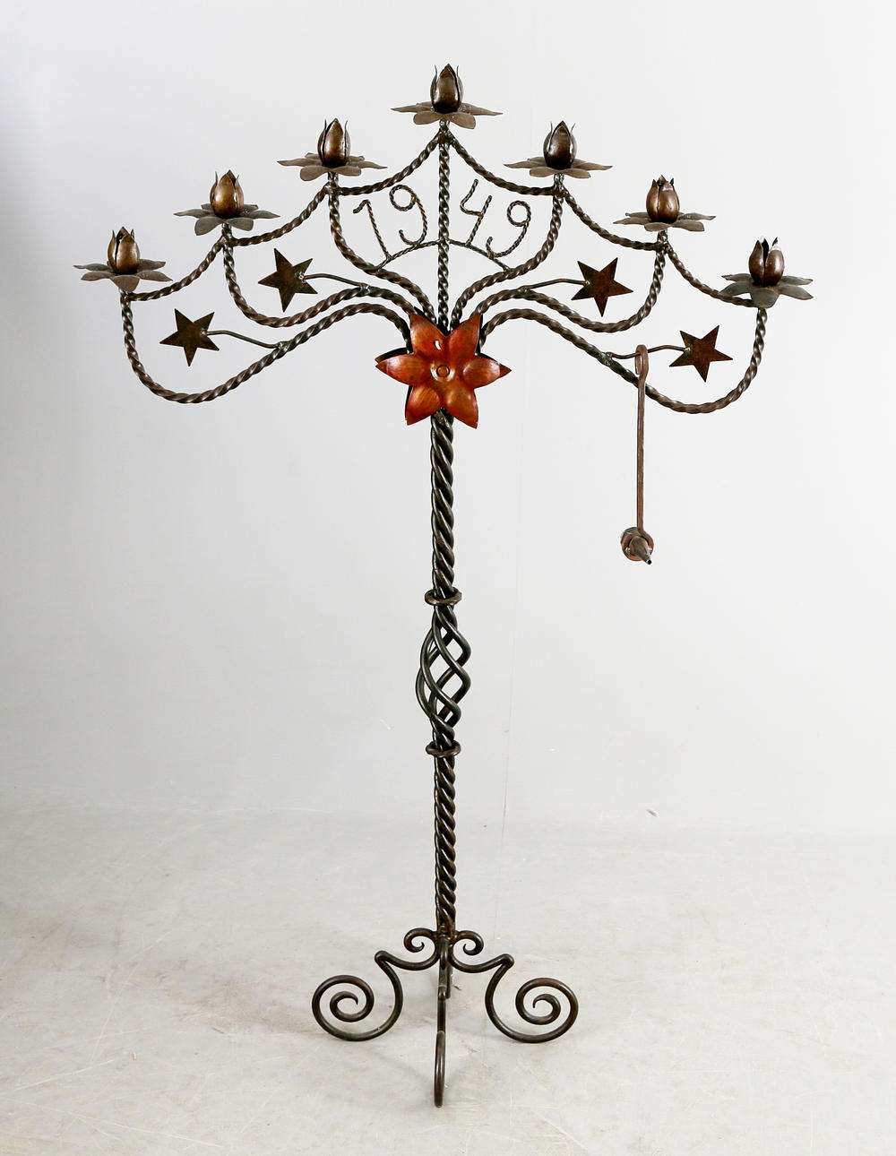 GOLVLJUSSTAKE, smide, 1900-talets mitt.