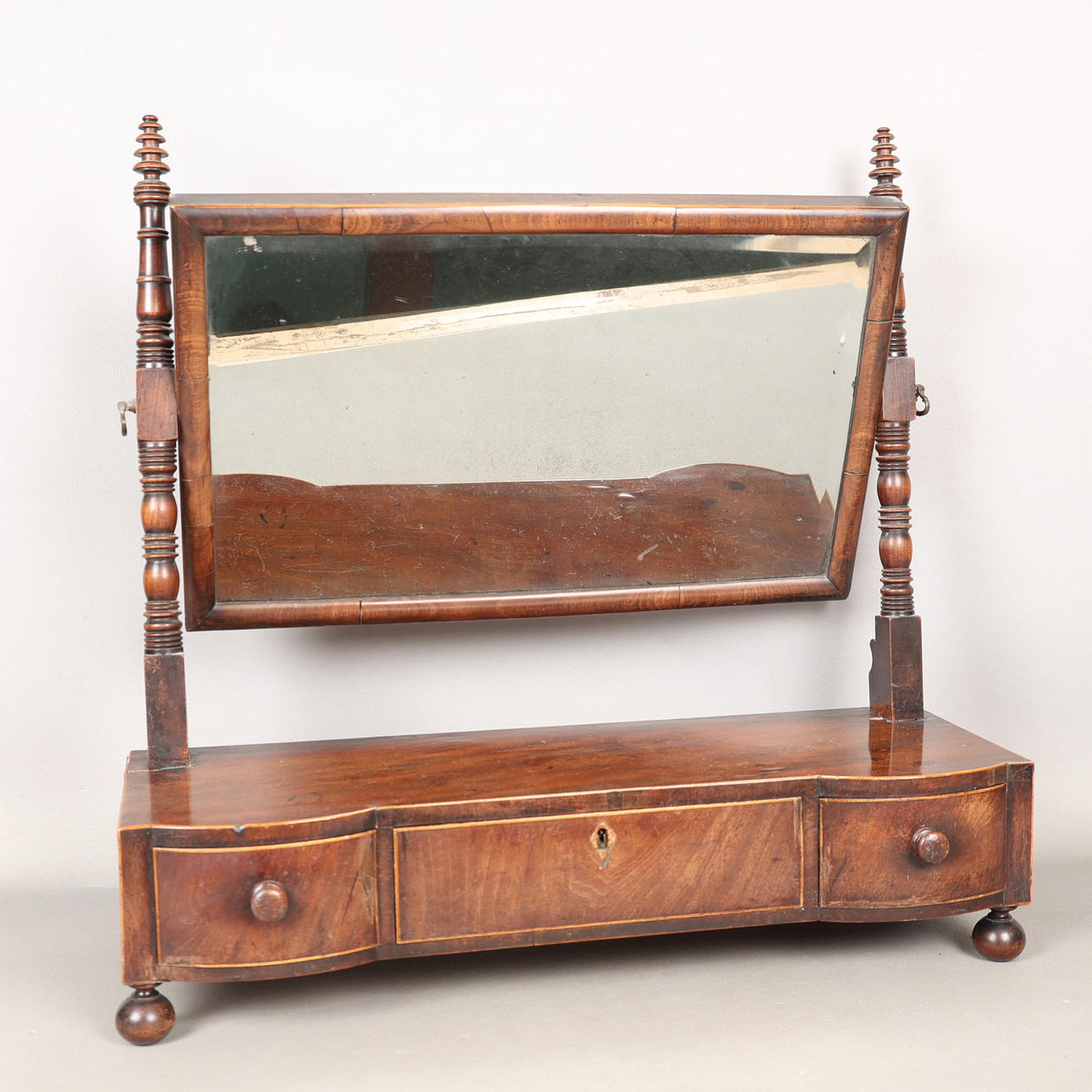 A 19TH CENTURY MAHOGANY SWING FRAME MIRROR.