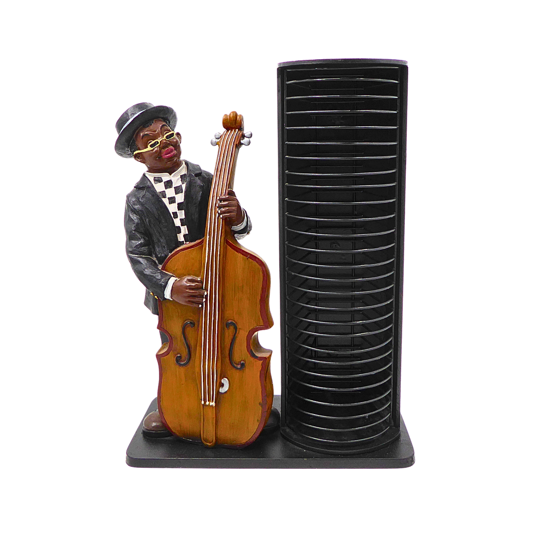 CD STAND WITH JAZZ MUSICIAN FIGURE.