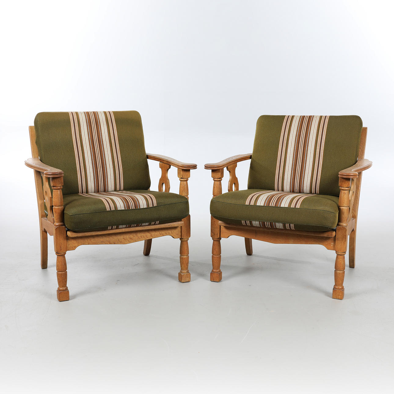 ATTRIBUTED TO KJÆRNULF. Pair of solid oak armchairs, 1960s (2).