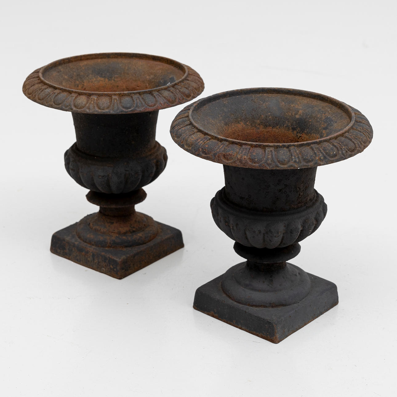 URNS, 2 pcs, cast iron, 20th century.
