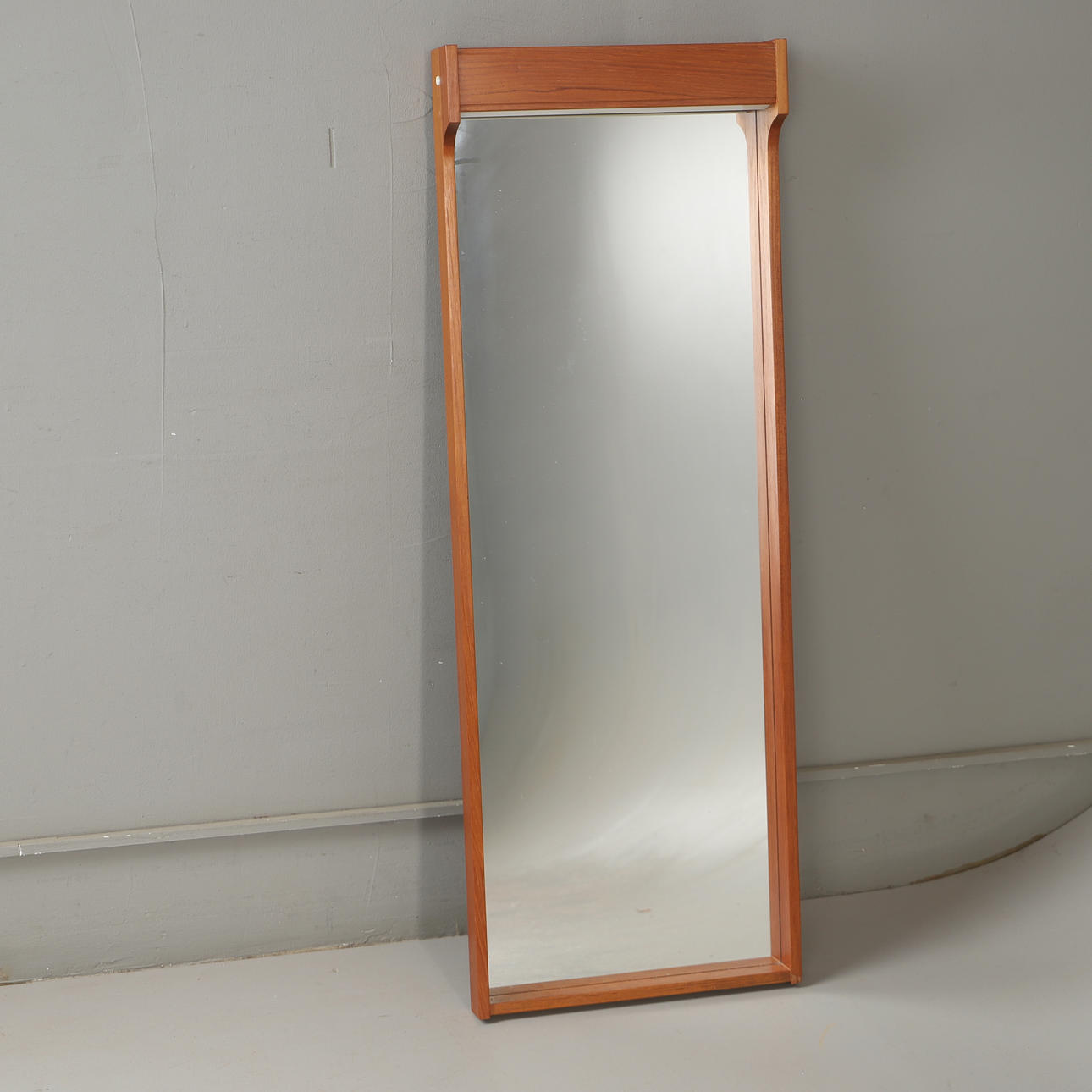 MIRROR. teak, mid-20th century.