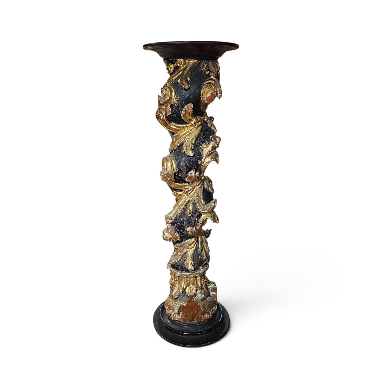 Carved and gilt solomonic column with scrollwork.
