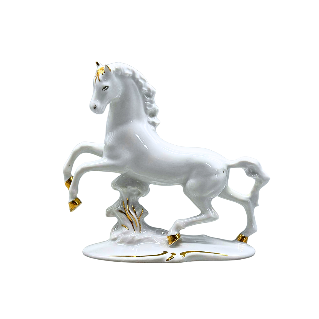 CROWN ARPO. PORSLINSFIGUR AV EN HÄST