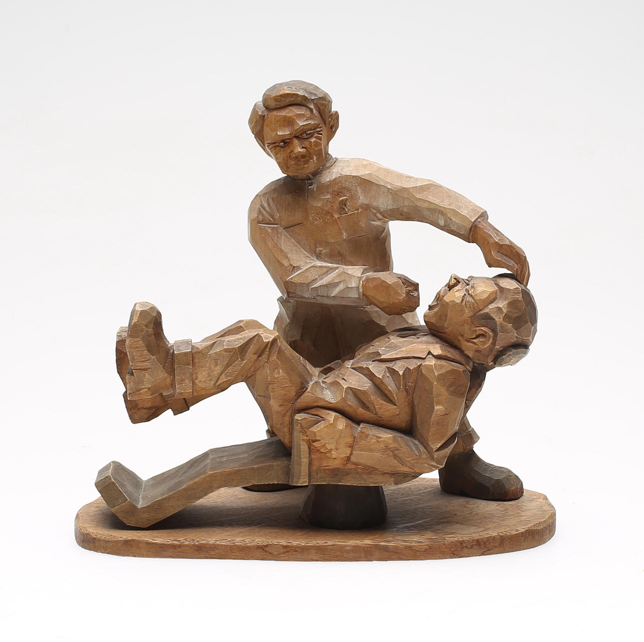 FIGUR, skuret trä, signerad G.T, daterad 1941.