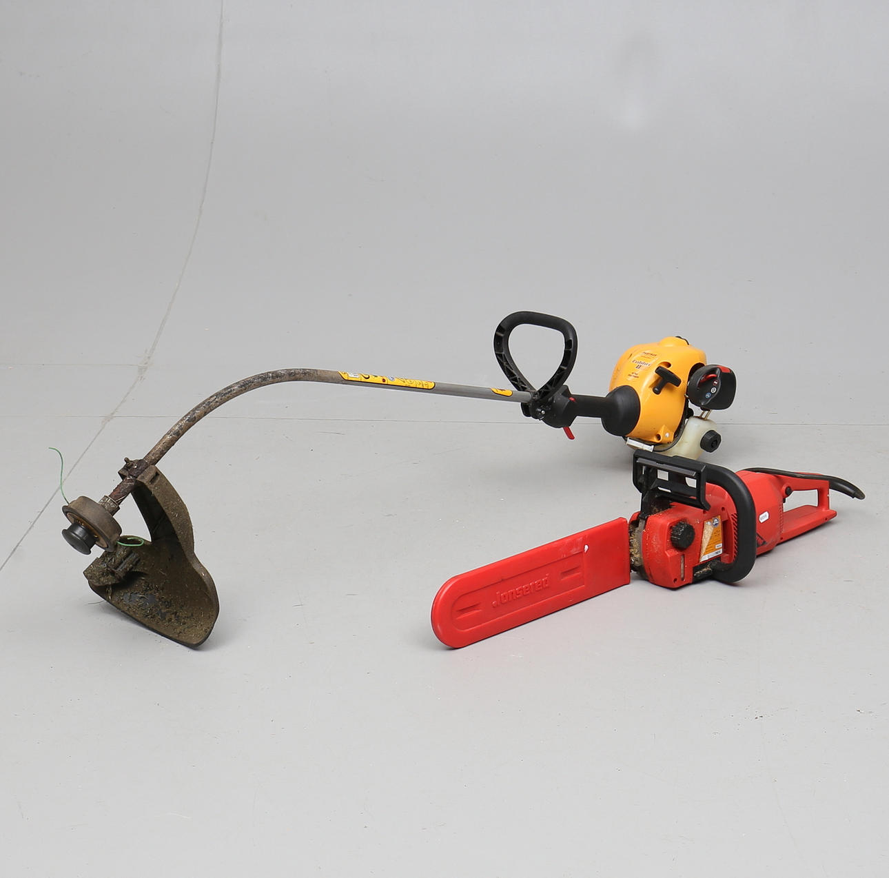 ELEKTRISK MOTORSÅG OCH GRÄSTRIMMER, Jonsered och Partner, 2000-tal.