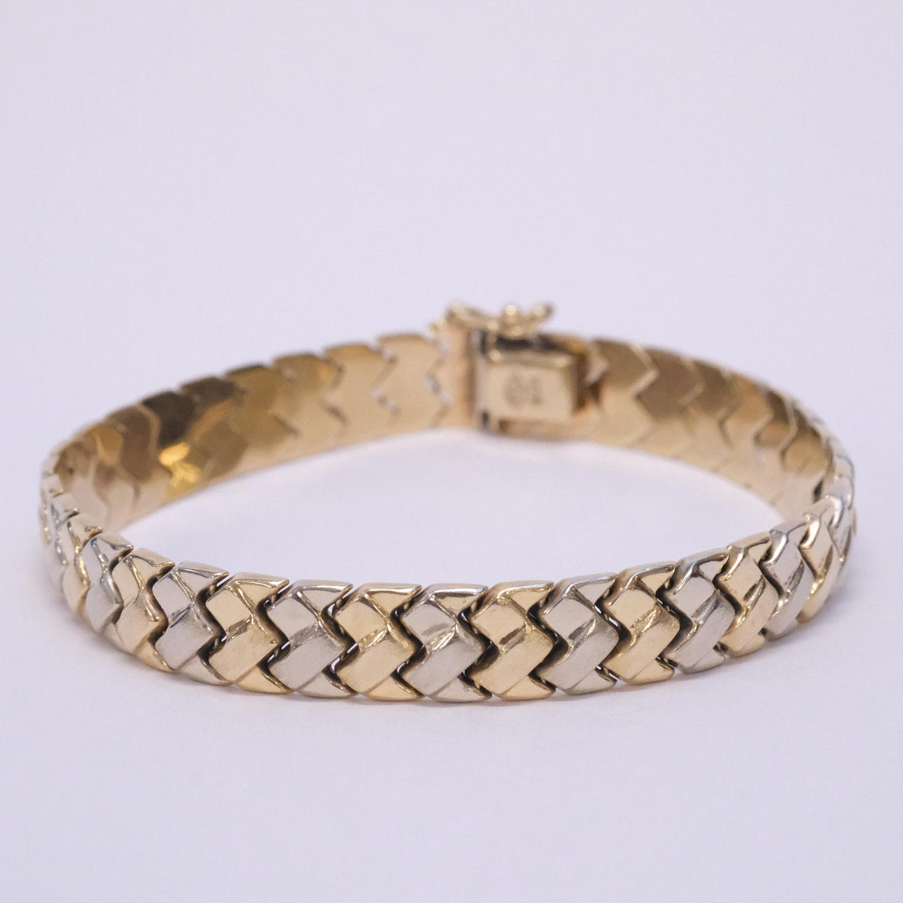 BRACELET, 14K RED AND WHITE GOLD.