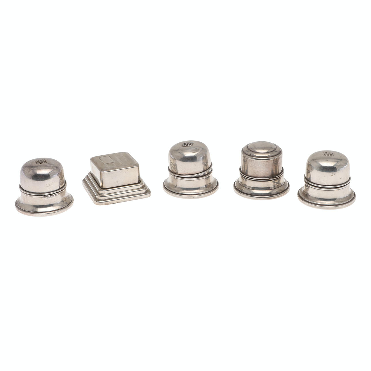 FOUR SILVER RING BOXES AND A SILVER PLATED RING BOX.