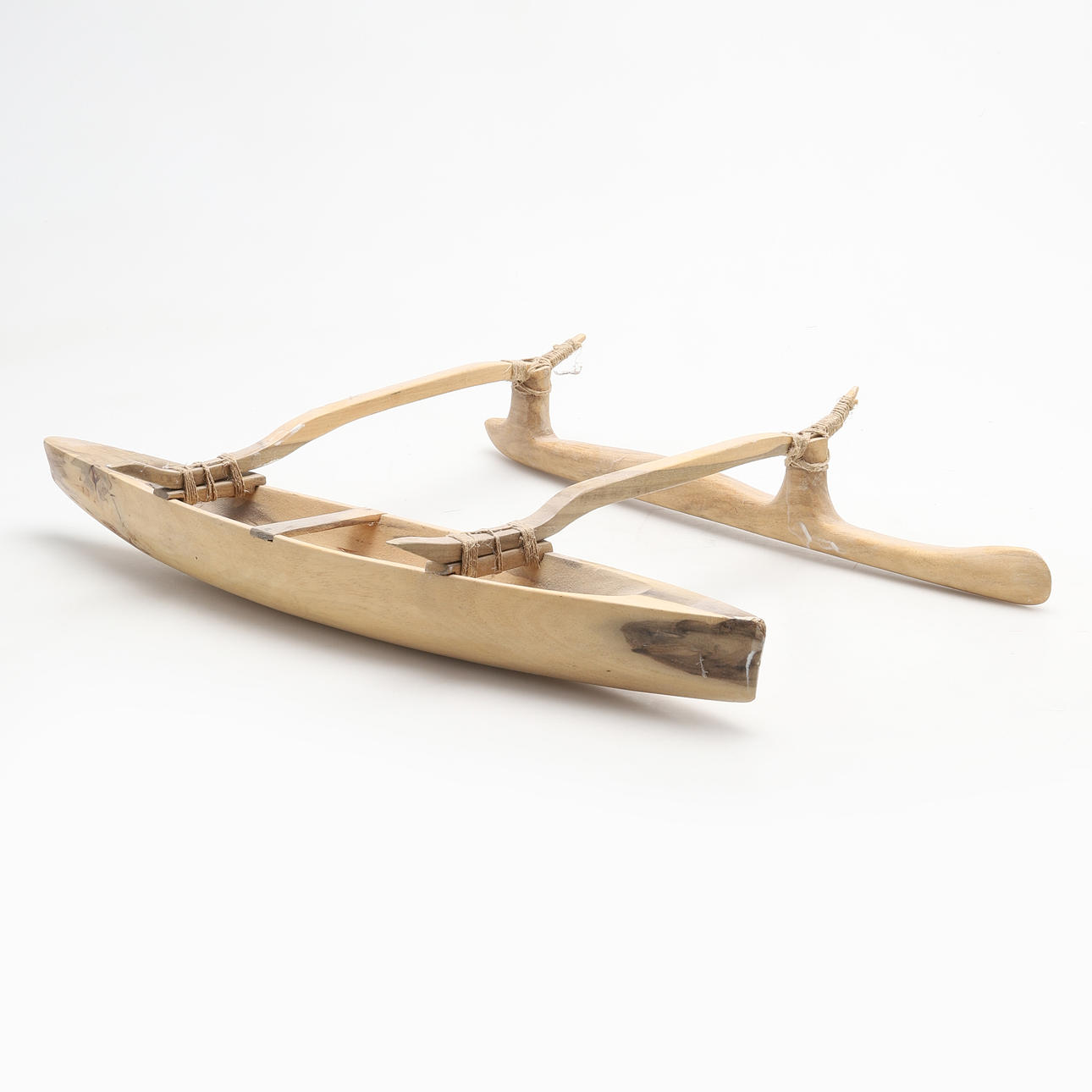 CANOE MODEL WITH OUTRIGGER, wood, 20th century.