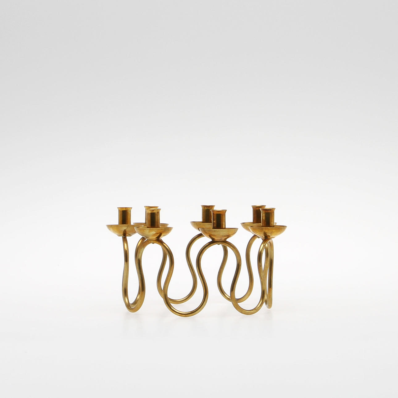 LJUSSTAKE, mässing, "Arvika", Lars Holmström.