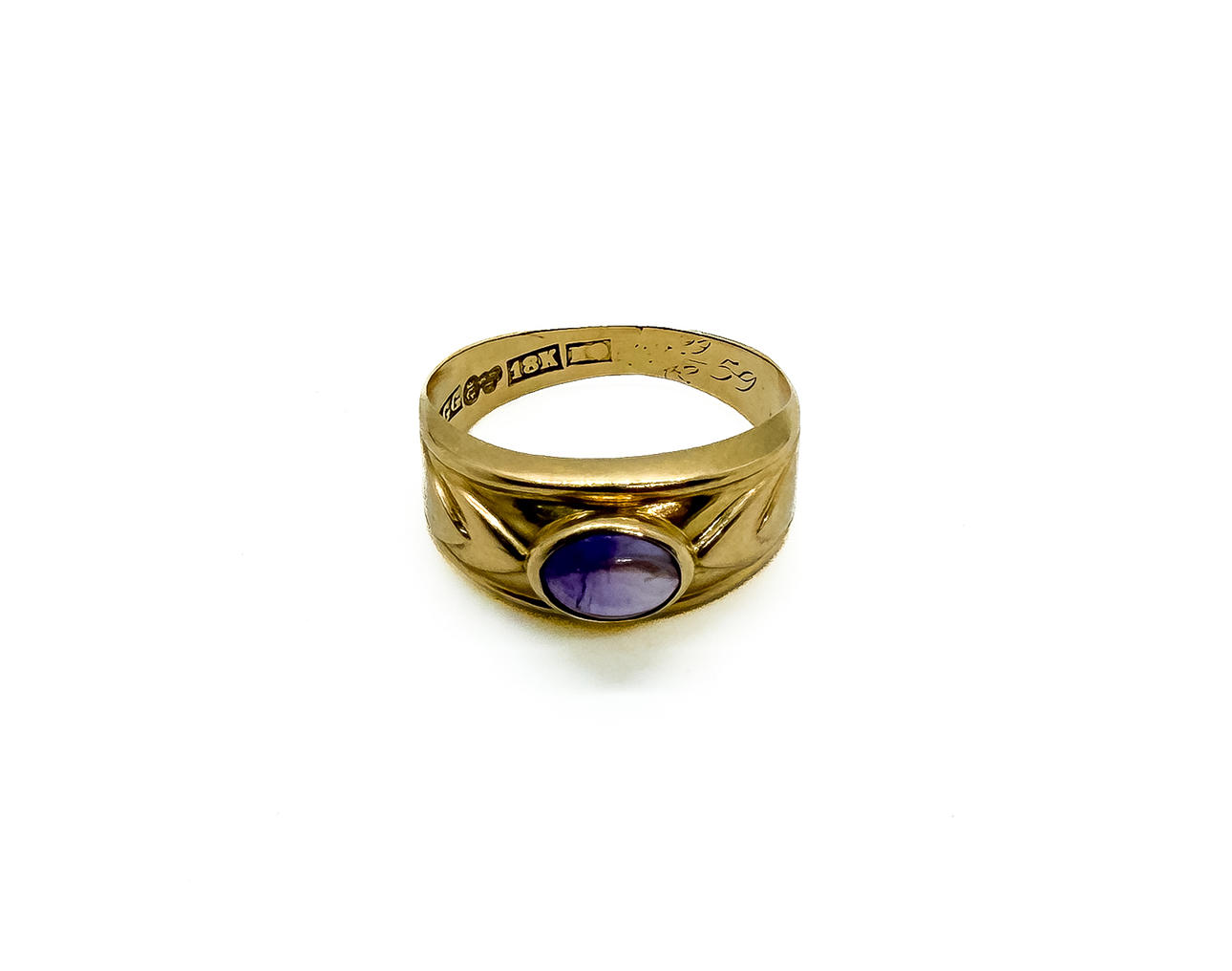 RING, 18k gold, purple stone.
