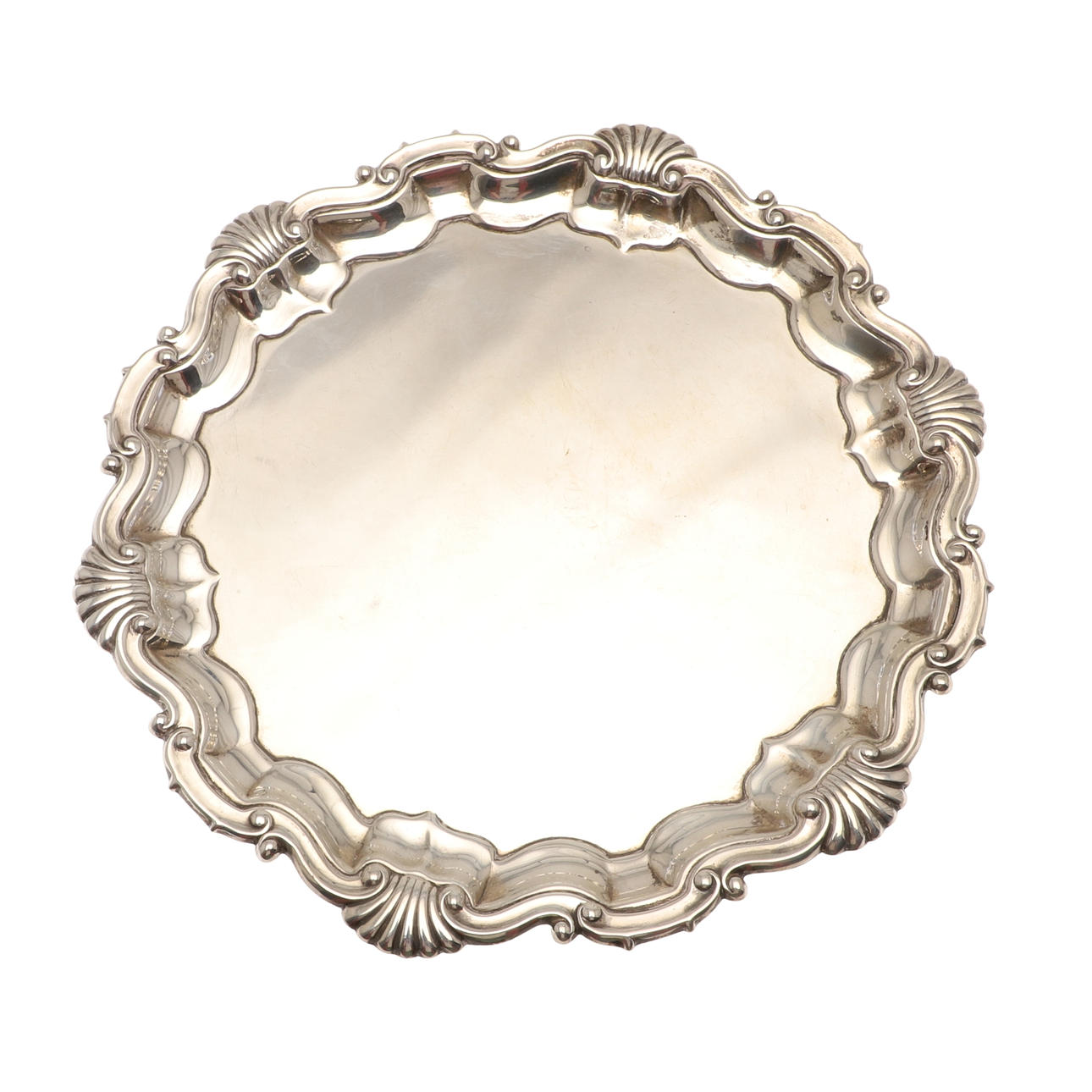 AN EARLY 20TH CENTURY SILVER WAITER.