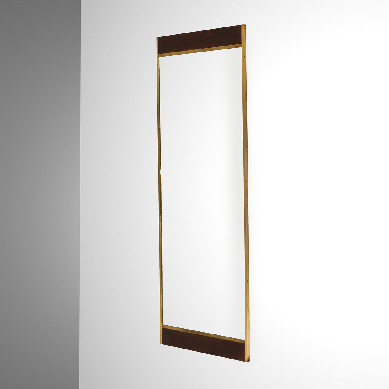 Rectangular mirror in rosewood and brass, 1950s-60s.