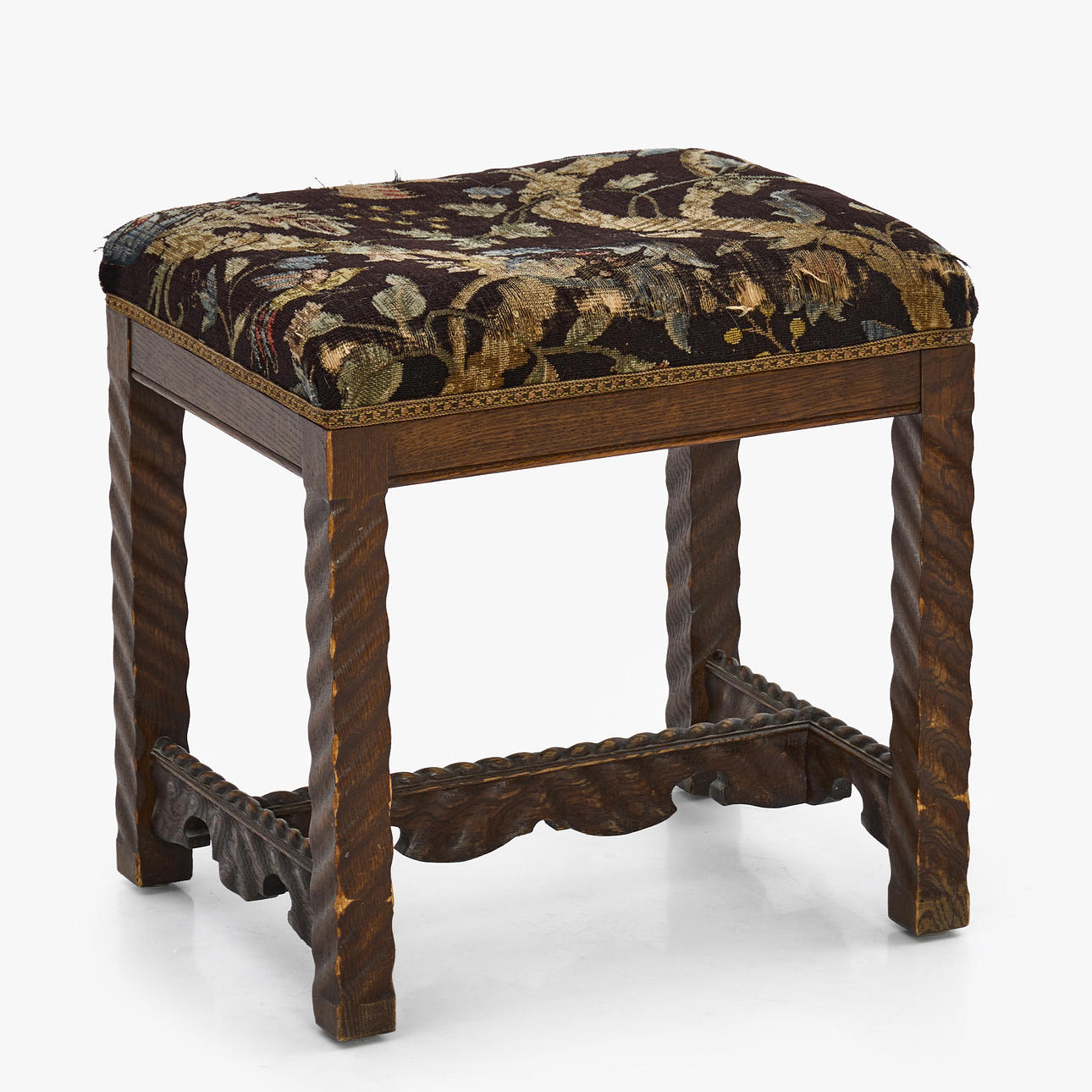 STOOL, carved oak, c. 1920, patterned textile.
