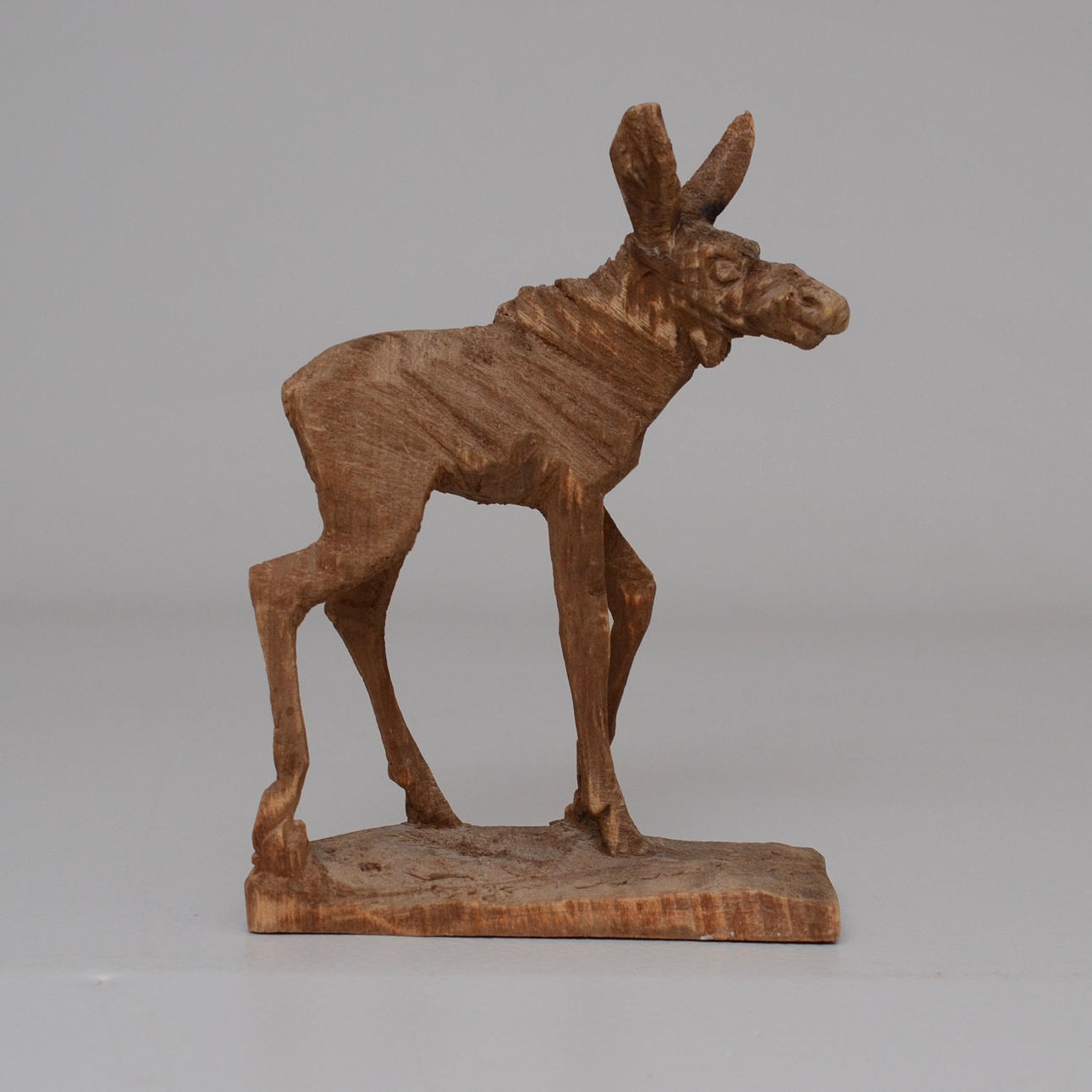 ERIK REIMHULT. årskalv, skulptur.