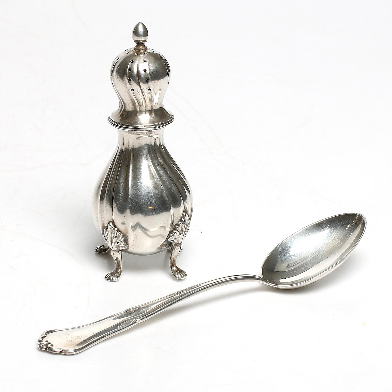 RUSKA och SKED, silver, C.H. Hallberg, 1936. Vikt 135 gram.