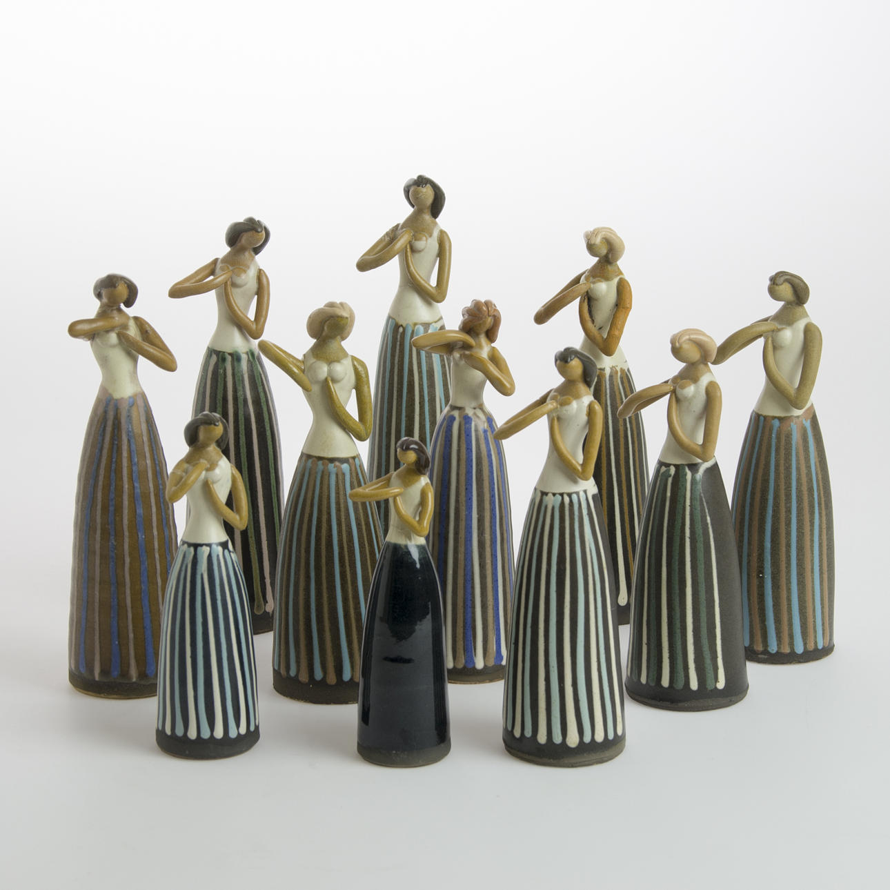 FIGURINER, 11 stycken, "Backafallsflickan", Cay Cedergren.