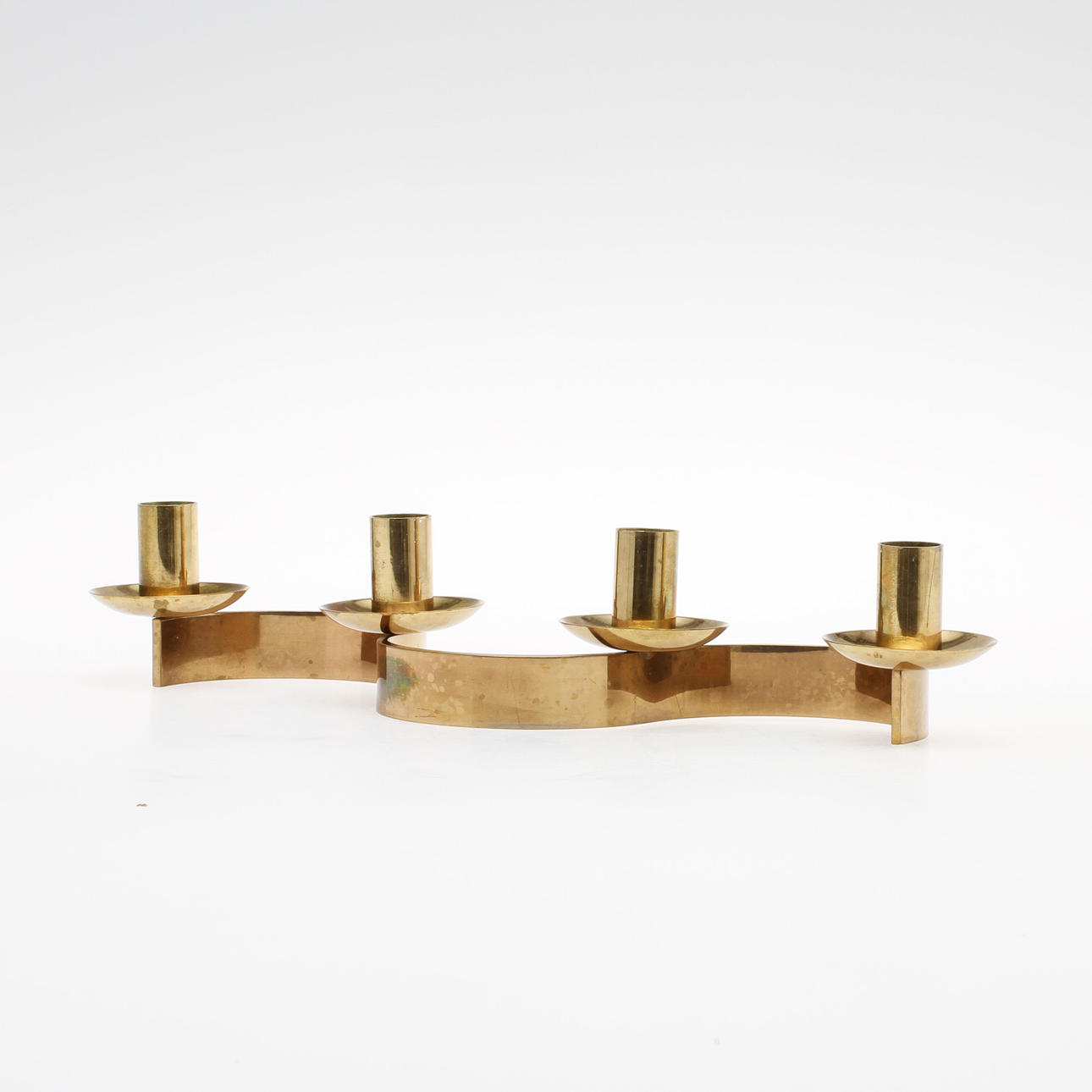 LJUSSTAKE "SLINGAN", mässing. Josef Frank för Firma Svenskt Tenn.