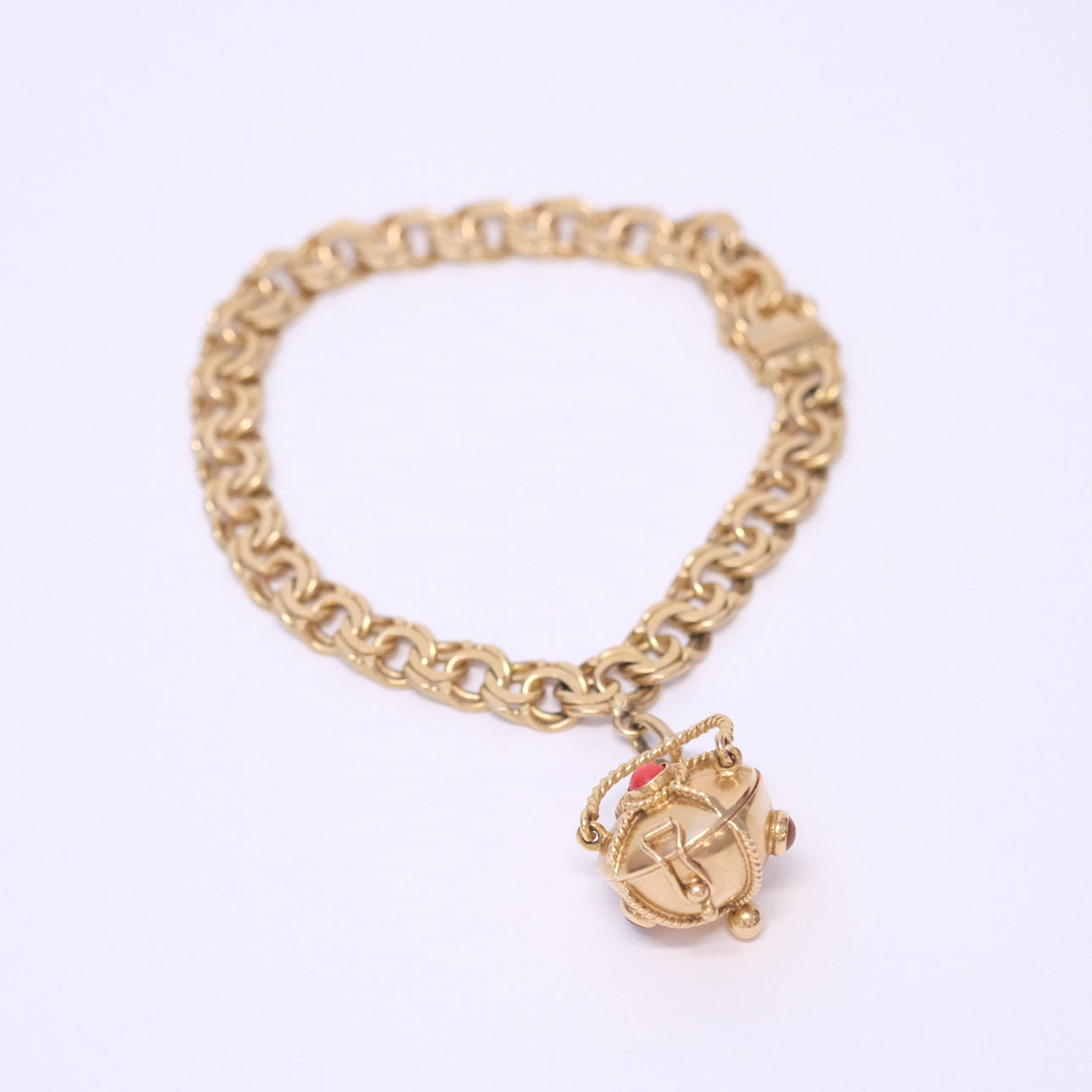 ARMBAND, BISMARCKLÄNK MED BERLOCK, 18K GULD.