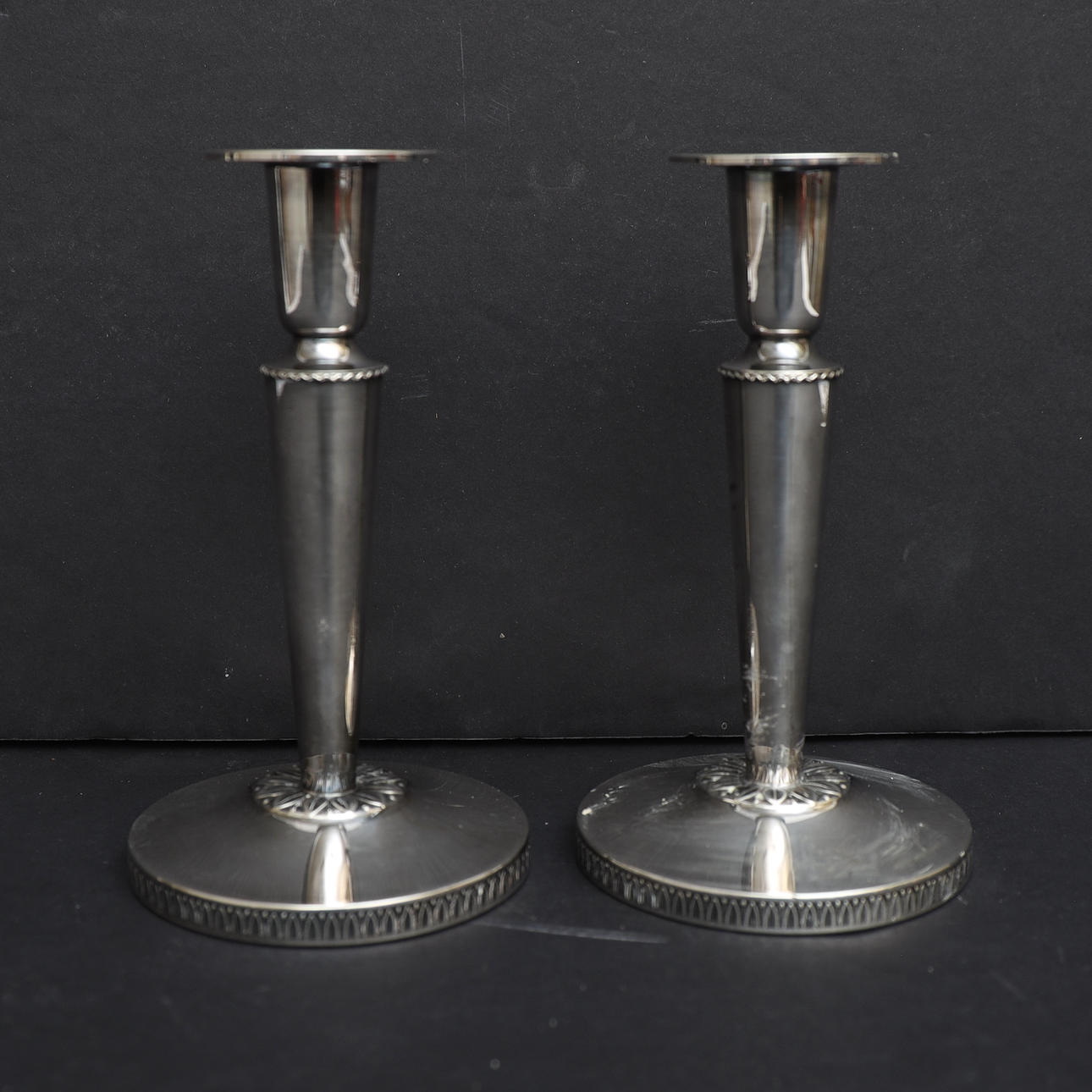CANDLESTICKS A PAIR, silver, K&EC, 1972, decorated with, among other things, a wave border, stamped.