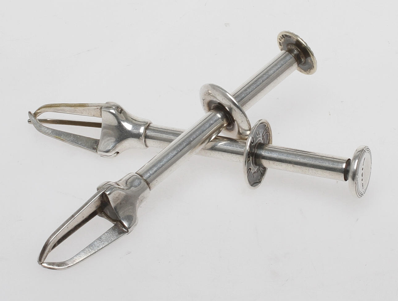 SOCKERTÄNGER, 2 st, silver, 1930-tal.