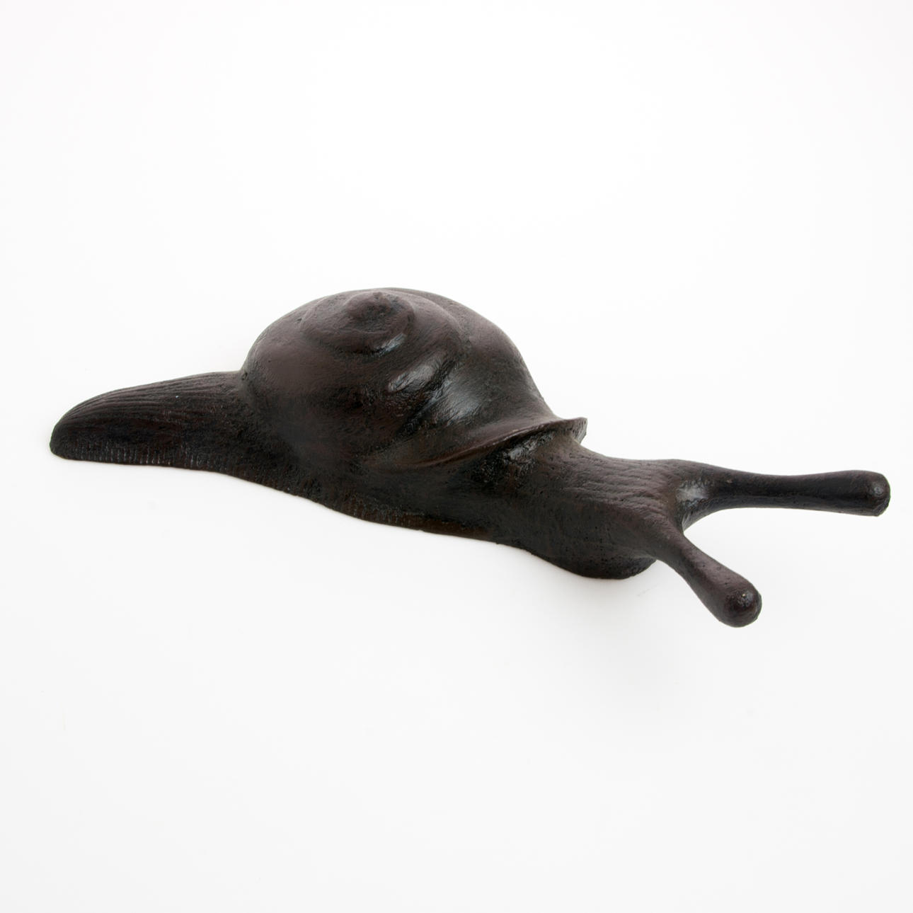 STÖVELKNEKT i form av snigel, målad gjutjärn, samtida.