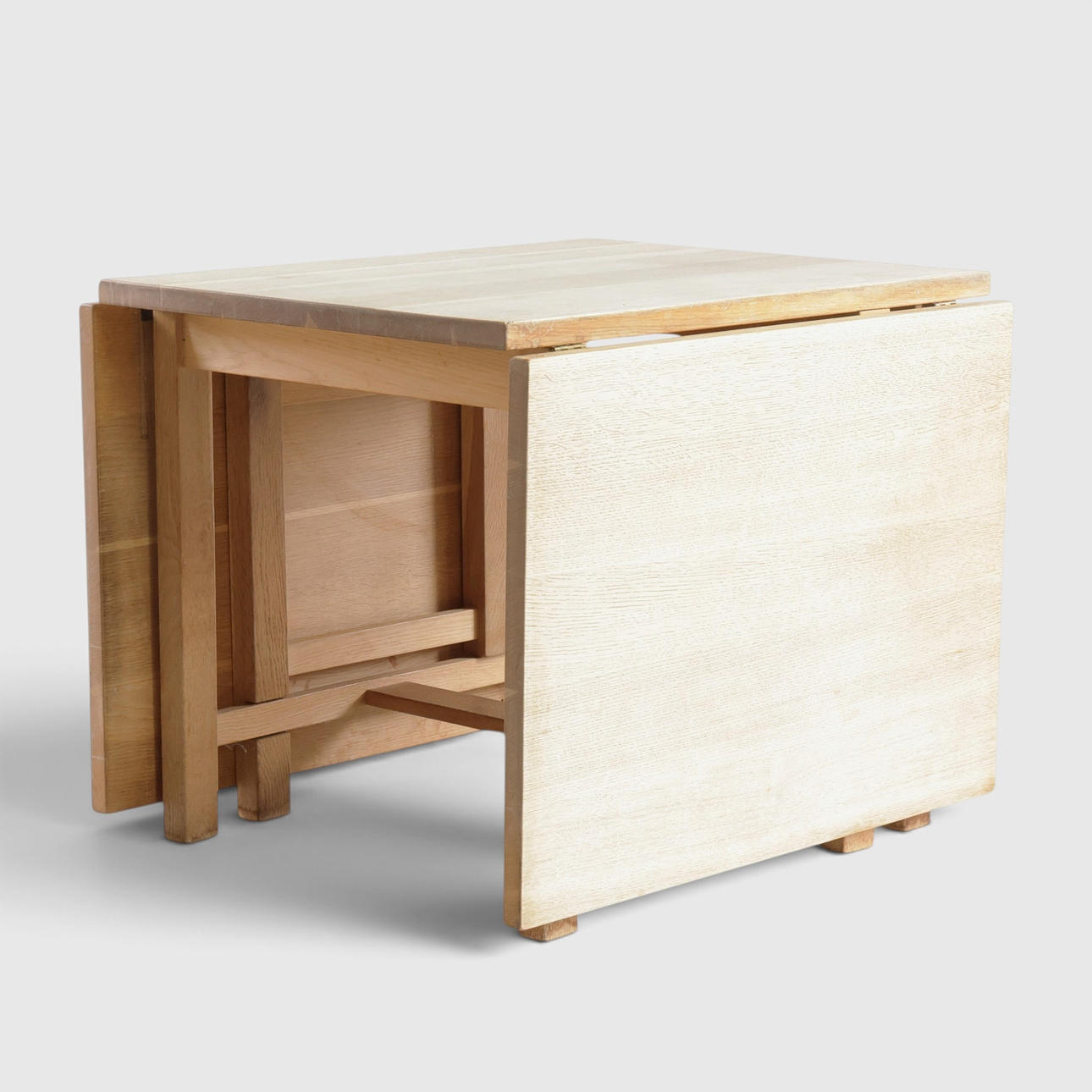 Dining table in solid oak, with drop leaves on each side. Danish cabinetmaker, mid-20th century.
