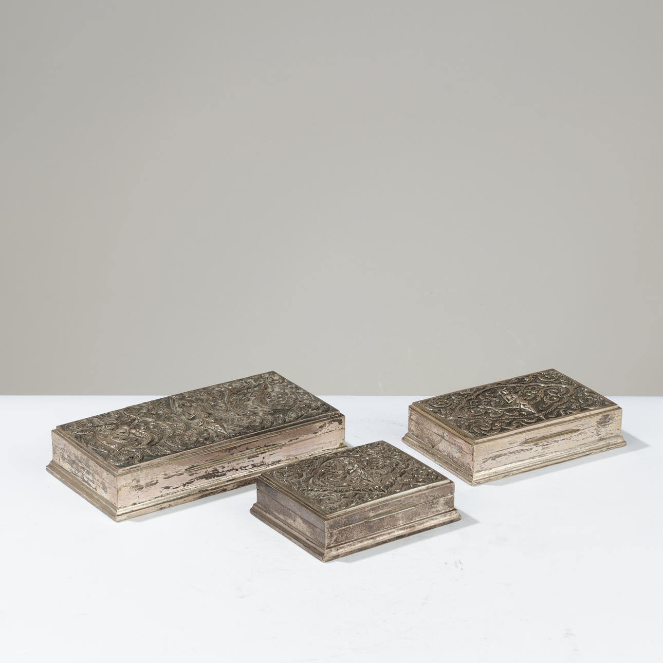 Three Siamese oriental lidded boxes - sterling silver cigarette boxes. Siam (Thailand) (3).