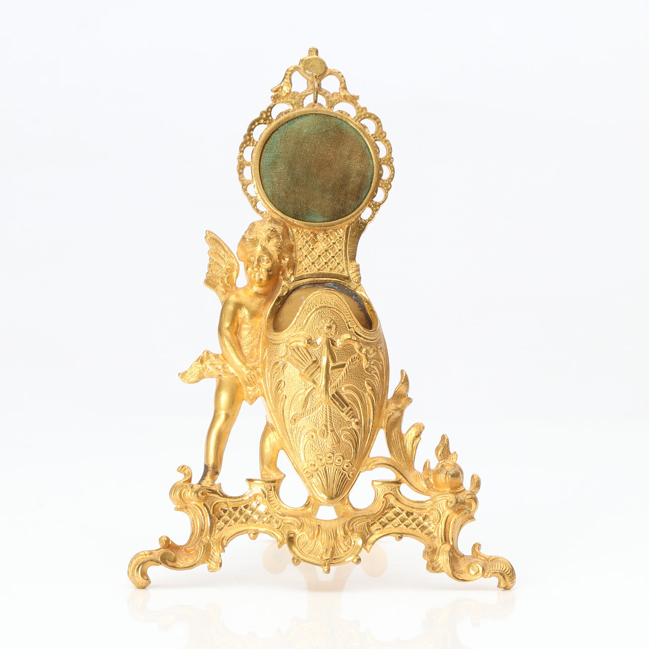 FICKURSSTÄLL. Förgylld mässing. Dekor av putto. Omkring år 1900