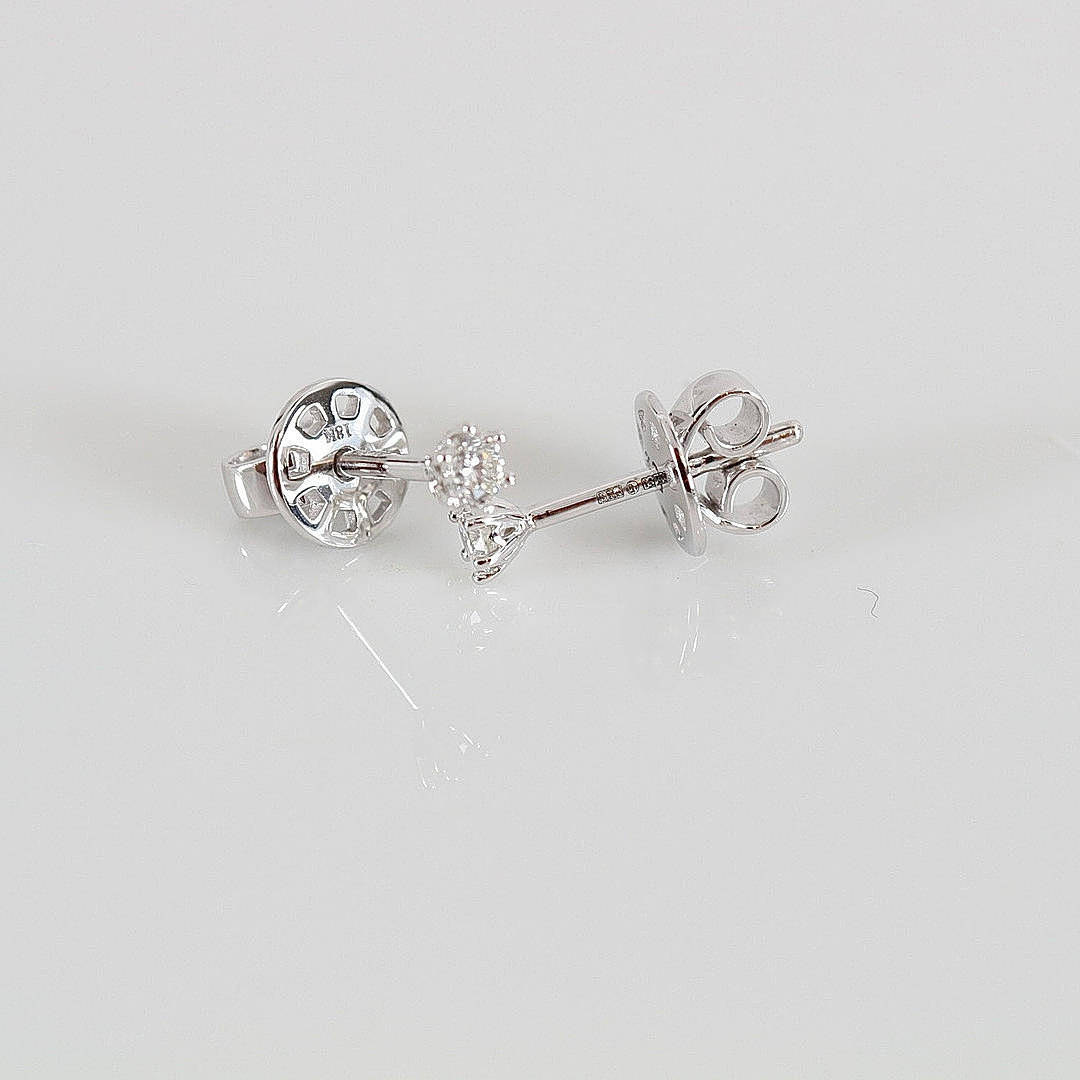 ENSTENSÖRHÄNGEN, 0,16ct, vitguld 18K.
