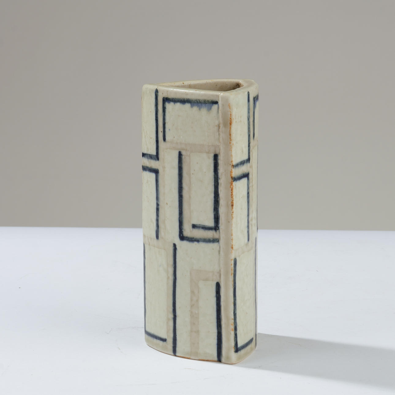 EVA STAEHR-NIELSEN. Triangular stoneware vase decorated with geometric pattern, model no. 22319, designed 1968, Royal Copenhagen, Denmark, produced in the period 1969-74.