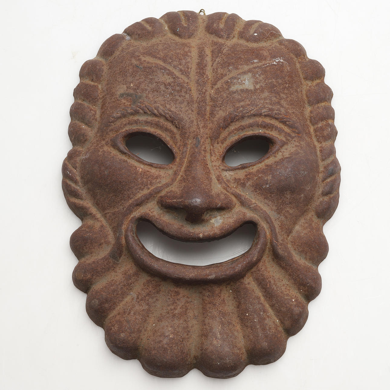 RELIEF, i form av maskaron, gjutjärn. 1900-tal.