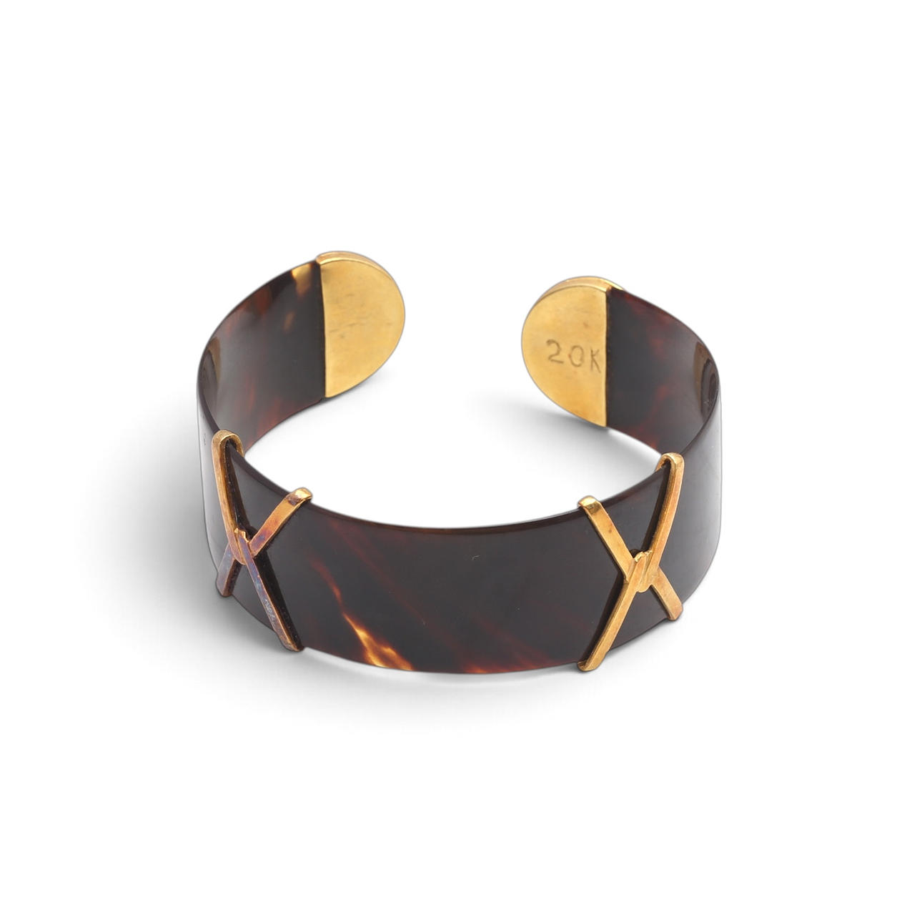 Öppen armring i guld.
