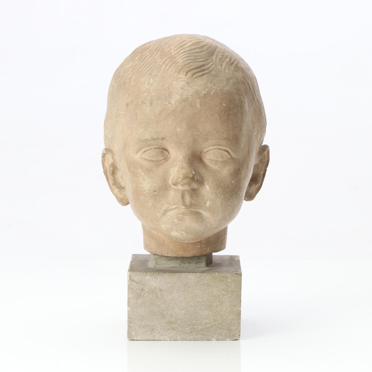 TOROLF ENGSTRÖM. SCULPTURE. Painted plaster. Child's head. Signed and dated 1933.