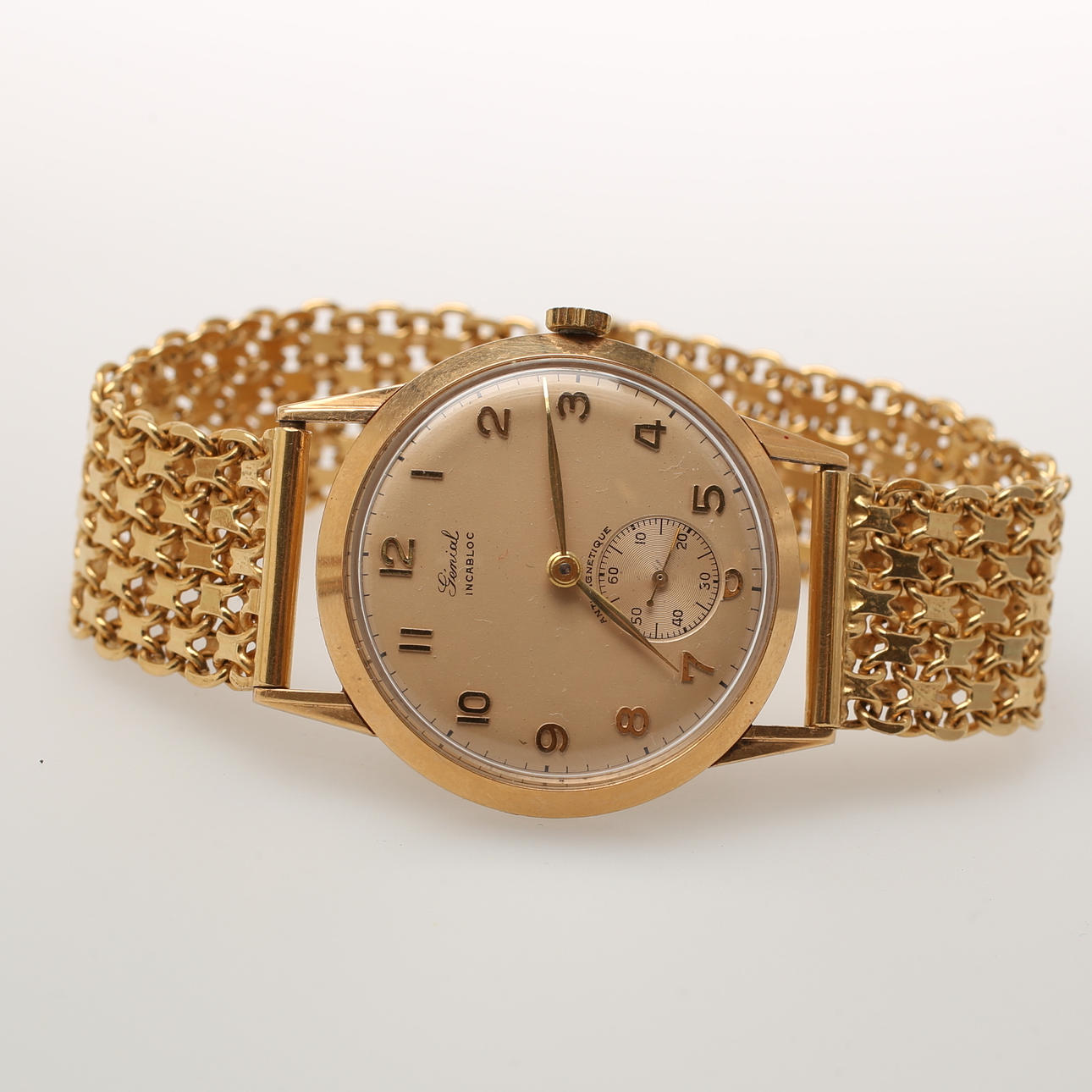 ARMBANDSUR, 18k guld, 64 gr. "Genial", Incabloc.