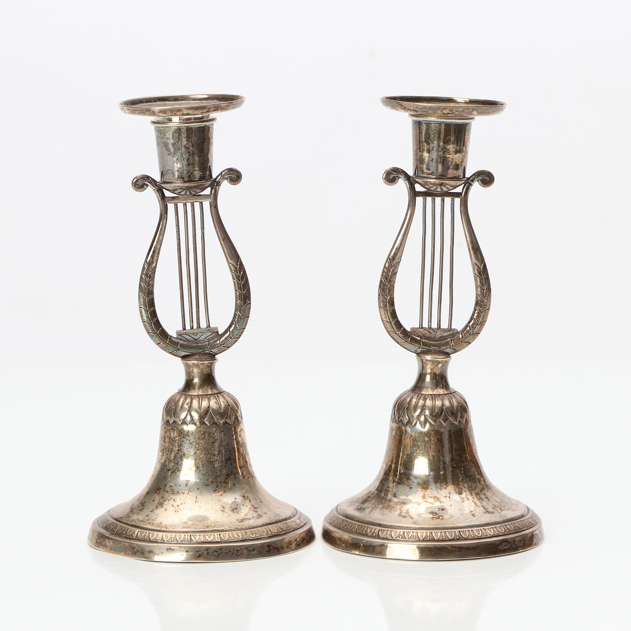 JOHAN ADOLF HAMNQVIST. CANDLESTICKS, A PAIR. Silver. Empire. Åmål. Not dated, silversmith active 1828-1866. Weight approx. 255 grams.