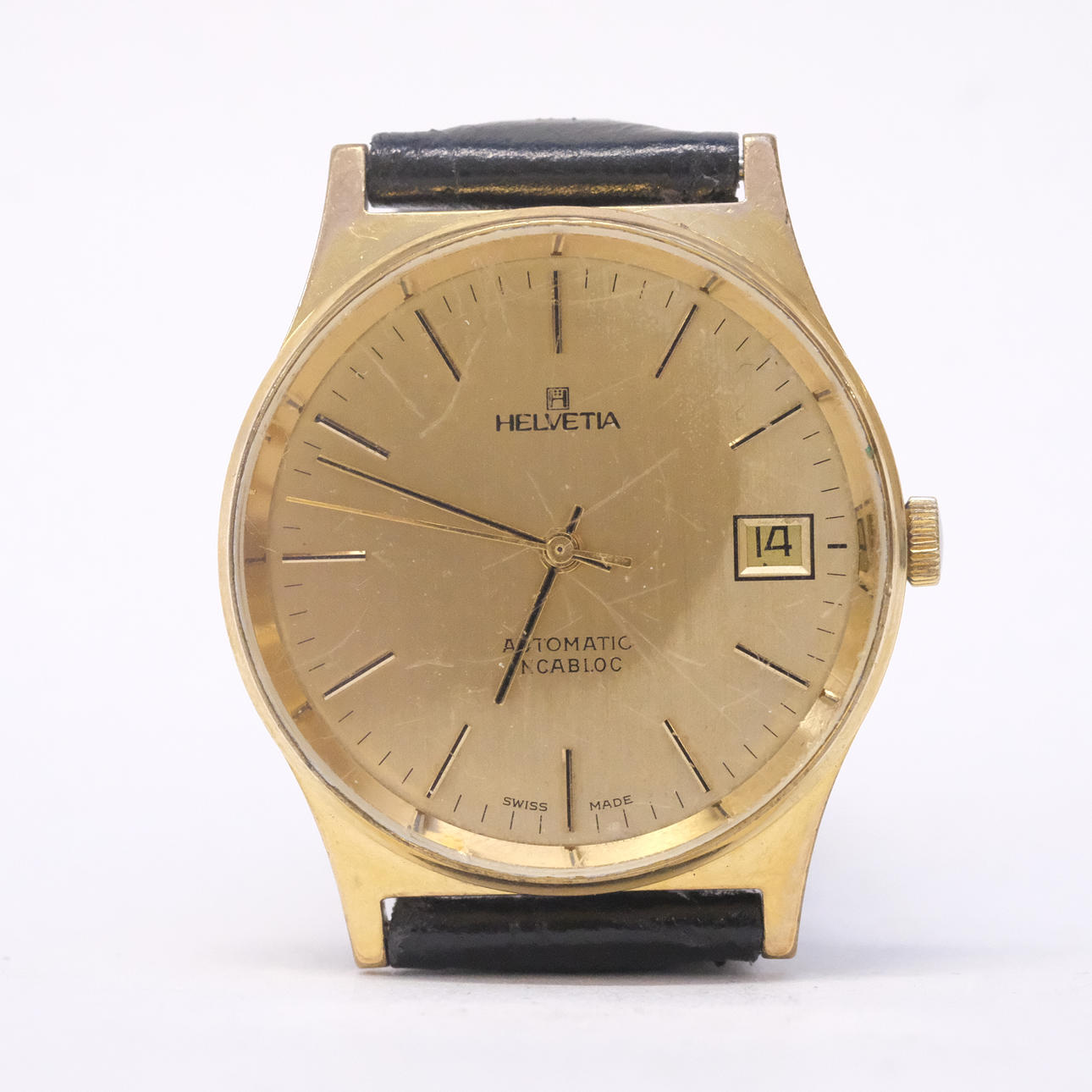 HELVETIA. ARMBANDSUR. AUTOMATIC. GULDDOUBLE.