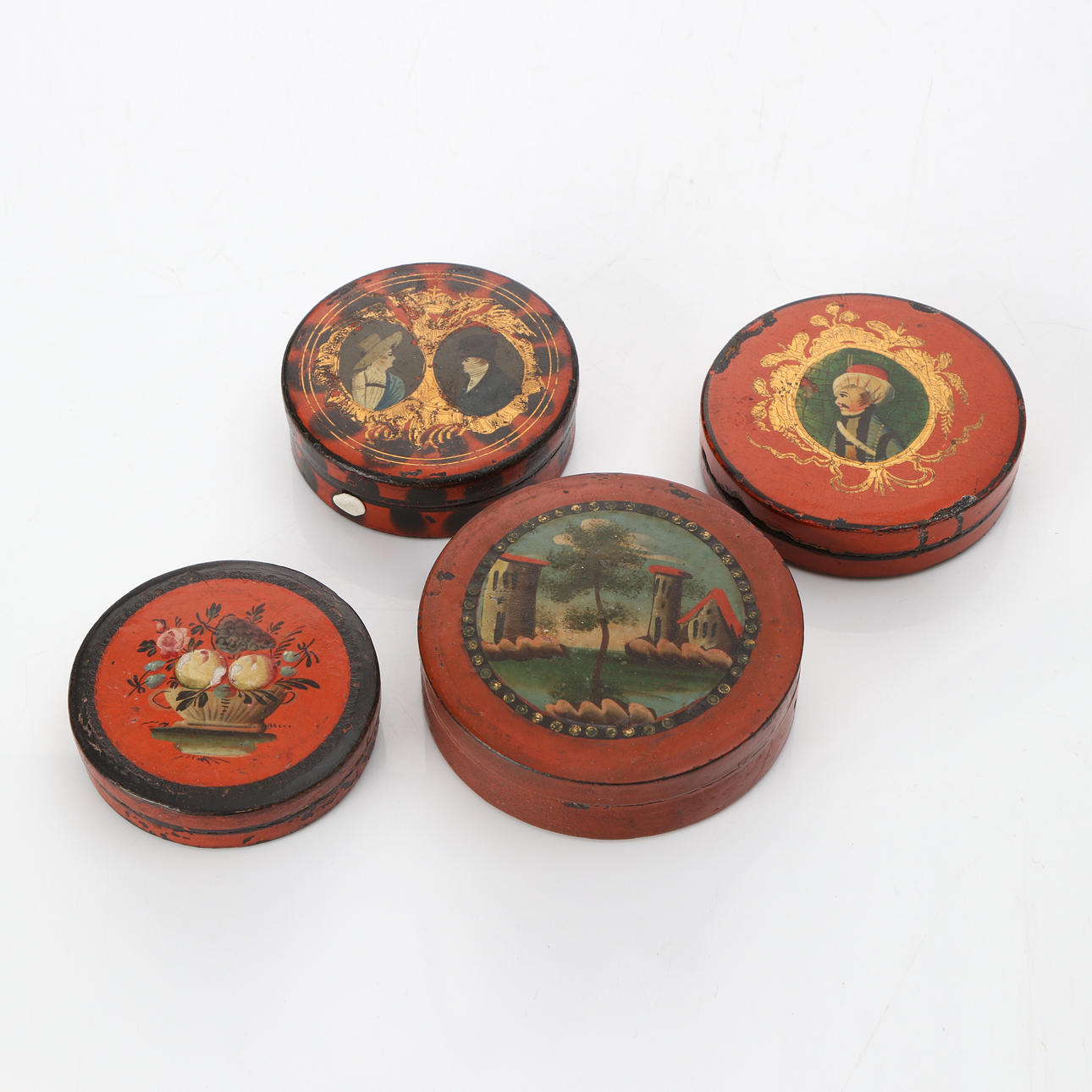BOXES, FOUR. Painted papier-mâché. 19th century.