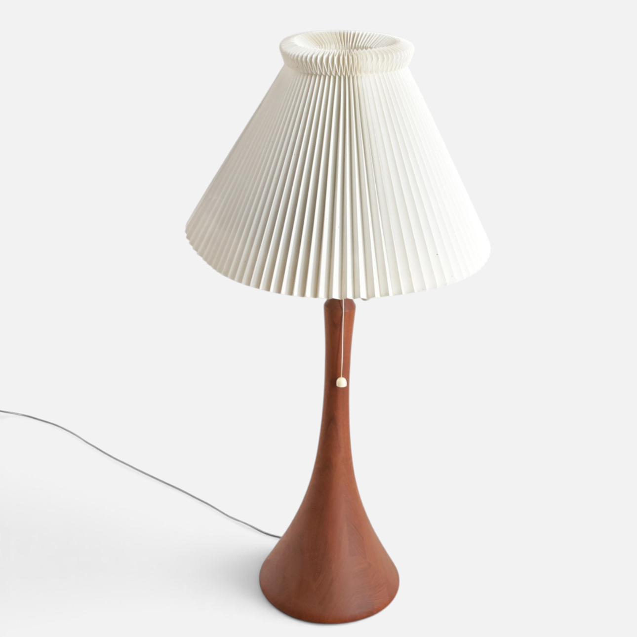 Table lamp in solid teak, conical shape. Denmark, 1960s.