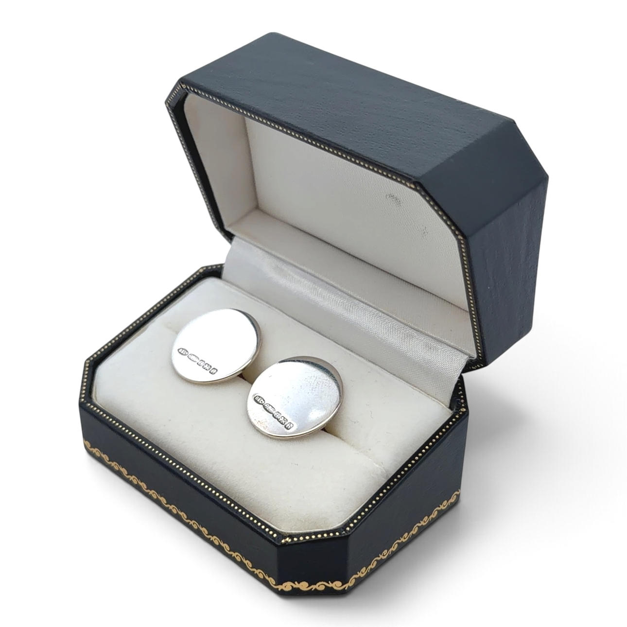 BOXED PAIR OF SILVER CUFFLINKS.