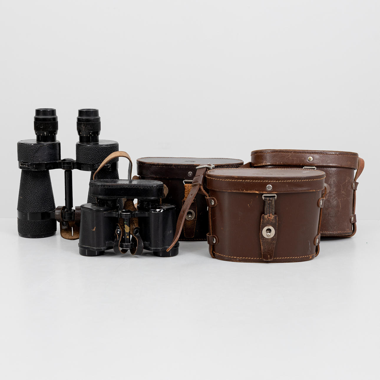 BINOCULARS, 5 pcs, various models and makes including AGA-Baltic, all marked with three crowns, primarily first half/mid-20th century.