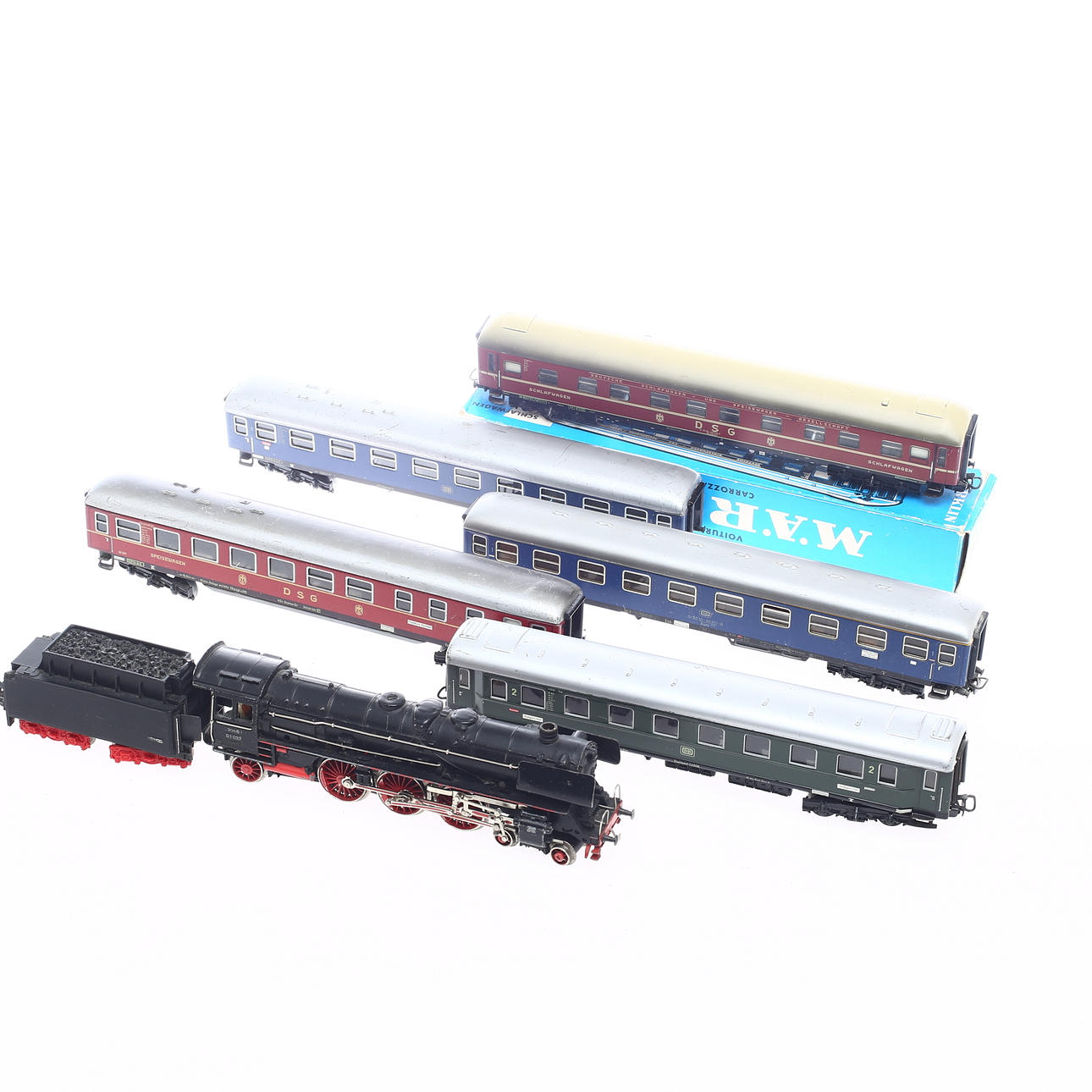 MÄRKLIN ånglok 3048 med tender samt 5 personvagnar. En originalkartong.