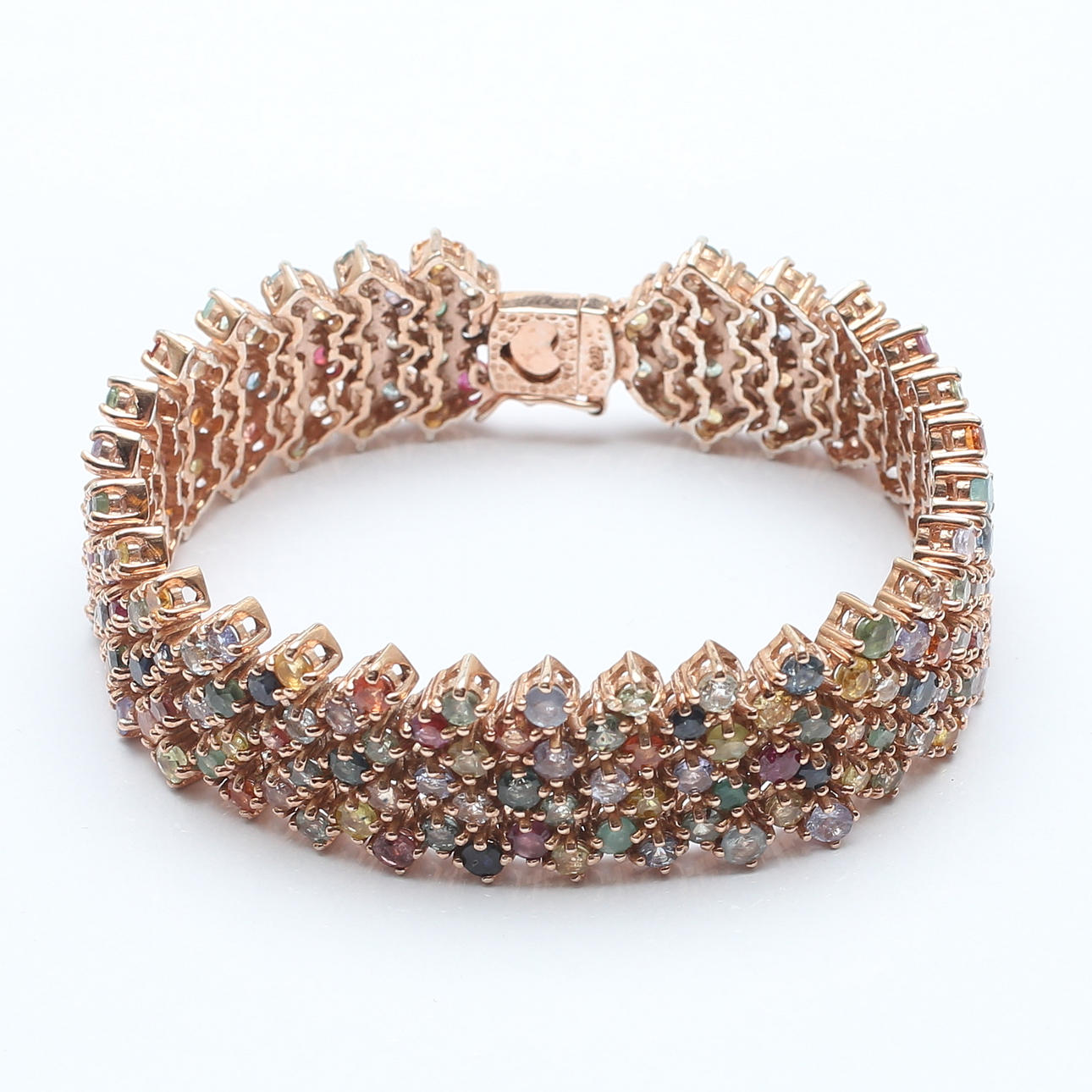 ARMBAND, roséguldspläterat sterlingsilver med ädelstenar, vikt 49,60 gram.