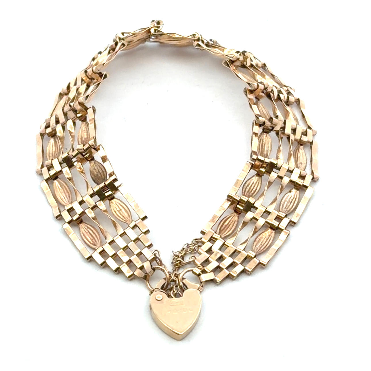 9CT GOLD GATELINK BRACELET.