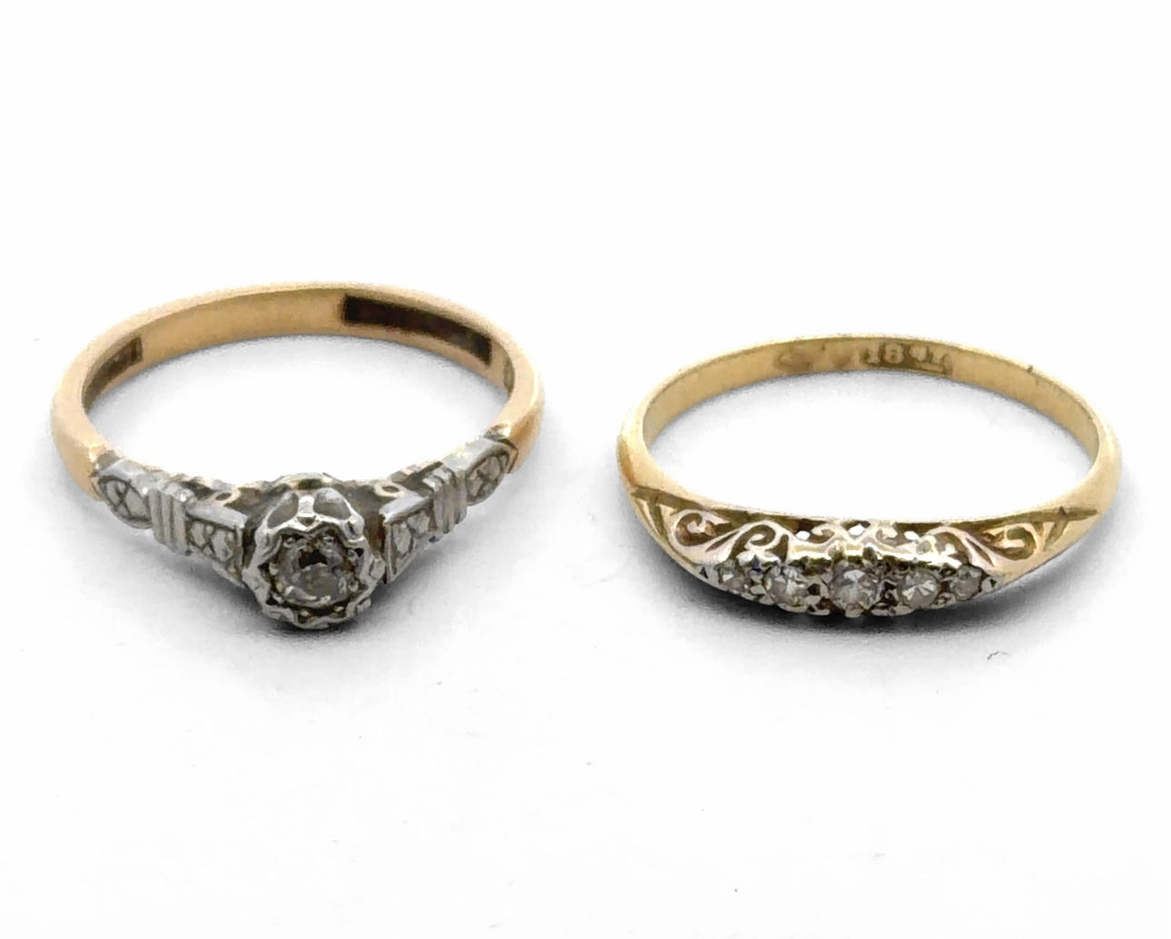 TWO 18CT GOLD AND DIAMOND RINGS.